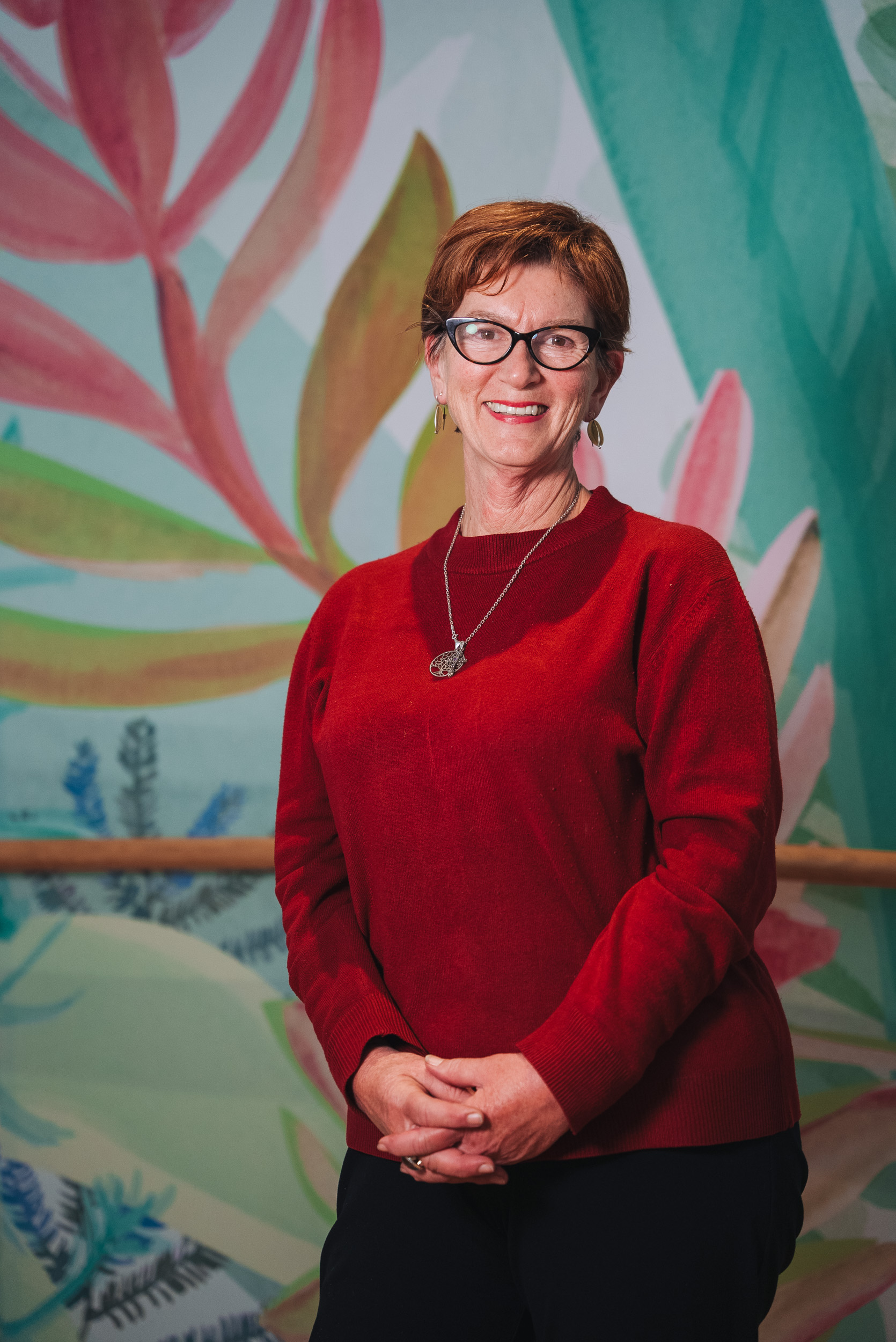 A person wearing a red sweater A person wearing a red sweater