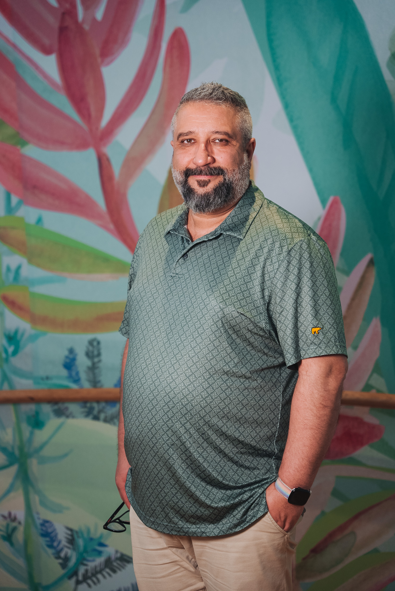 A person wearing a light green tshirt A person wearing a light green tshirt