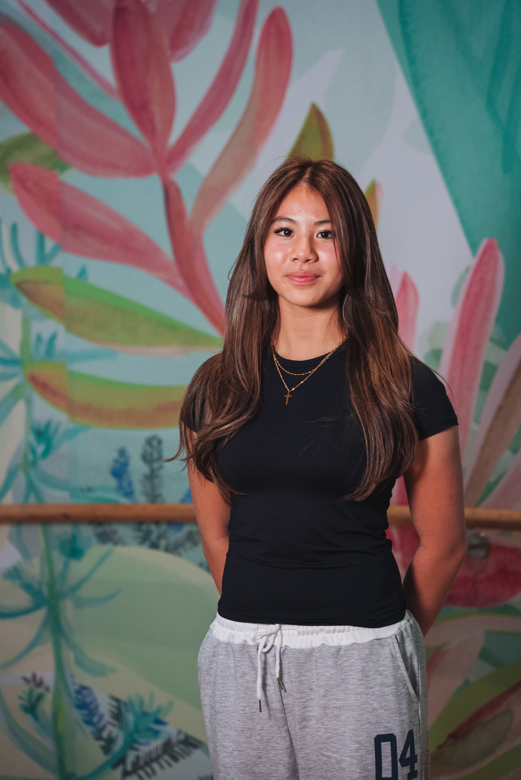 A young person wearing a black tshirt A young person wearing a black tshirt