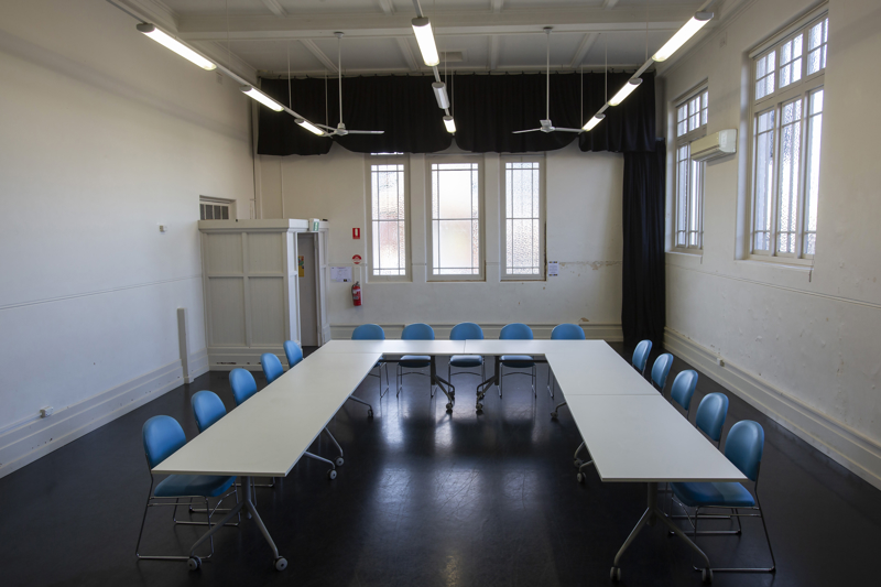 Coburg Courthouse interior with tables and chairs